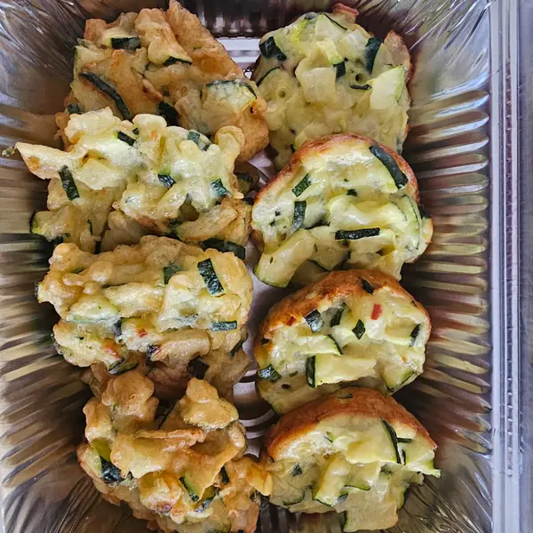 Zucchini fritters in a catering tray